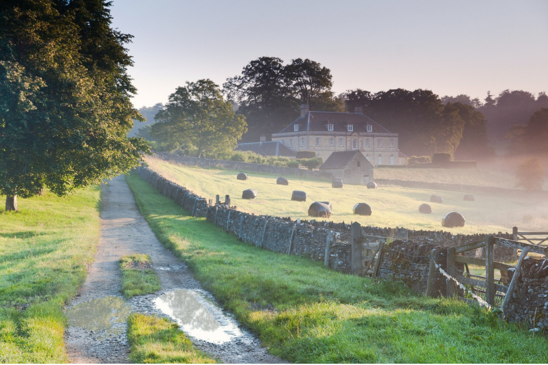 Rural country estate, country lane and field in UK